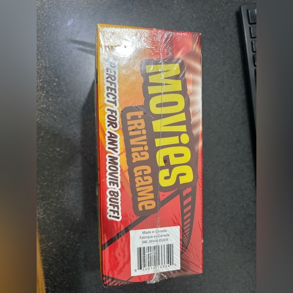 New in sealed package Movies Trivia Game by - Red and Yellow - Picture 2 of 3